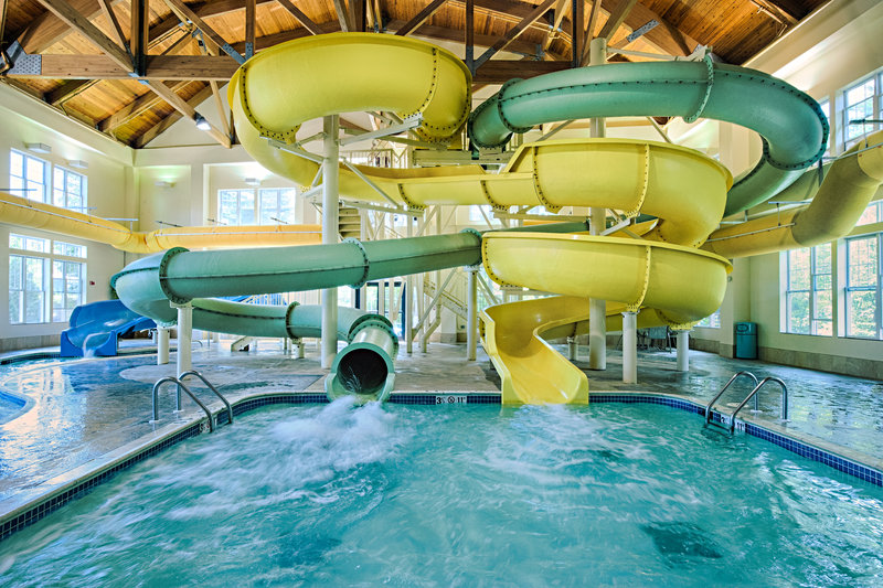 5,000 sq. ft. indoor water park with two water slides and wading pool for on-site family entertainment, all included in your room rate at Hampton Inn North Conway New Hampshire