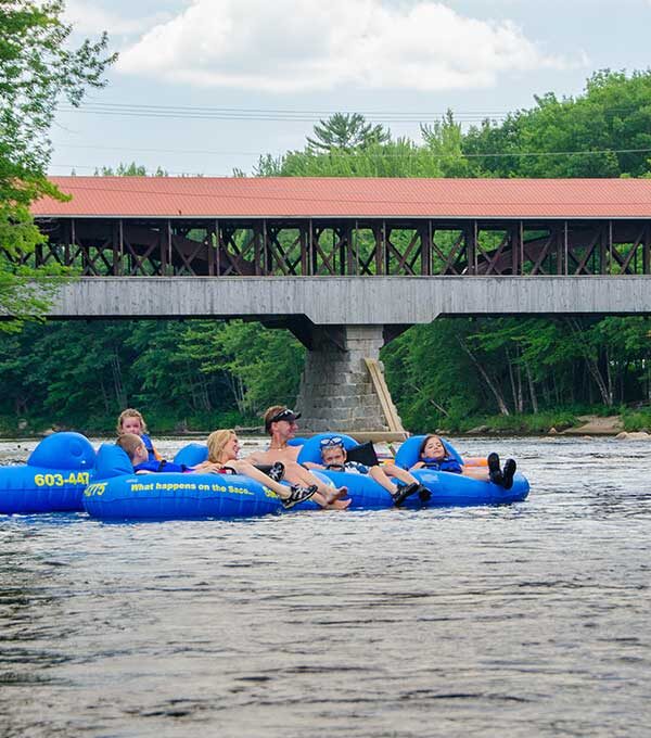Family tubing on the Saco River.