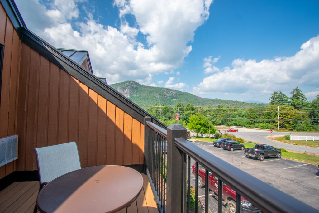 Attitash Motel room balcony with mountain views.